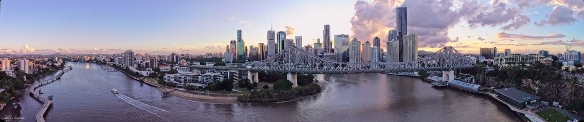 Panoramic view of bridge over river against sky