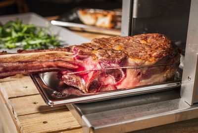 Close-up of meat on barbecue grill