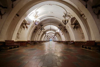 Empty illuminated subway at metro station