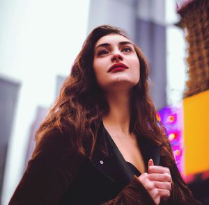 Young woman looking away, nyc