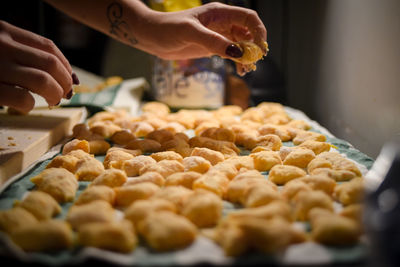 Cropped image of woman preparing food