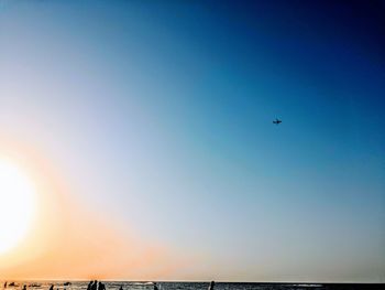 Low angle view of airplane flying in sky