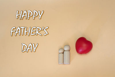High angle view of heart shape over white background