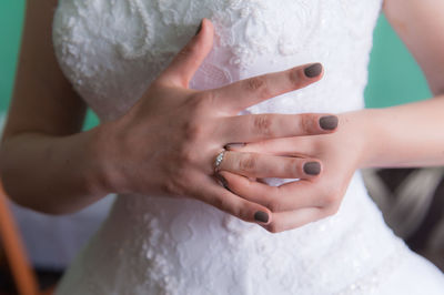 Close-up of couple holding hands