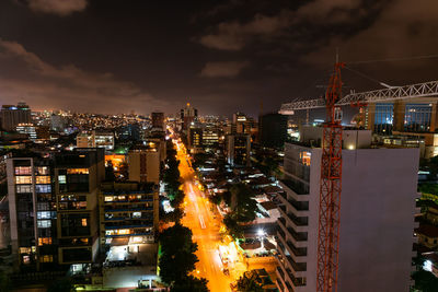 High angle view of illuminated buildings in luanda city at night