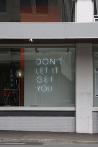 Information sign in front of building