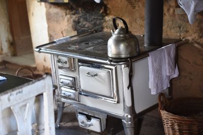 Close-up of old machine in kitchen at home