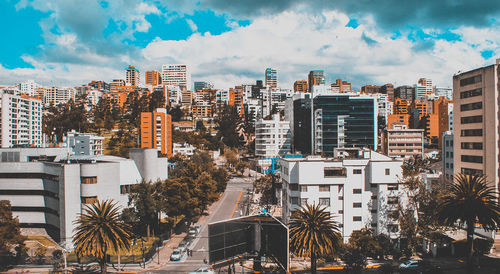 Buildings in city against sky