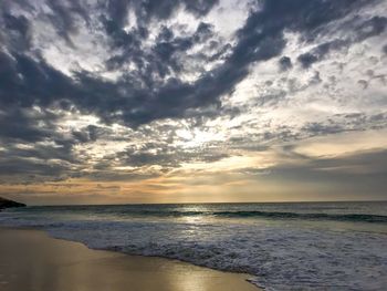 Scenic view of sea against sky at sunset