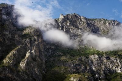 Scenic view of mountain range against sky