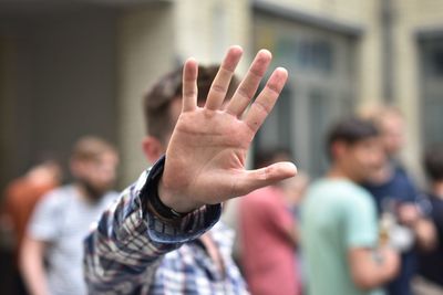 Close-up of a stop gesture