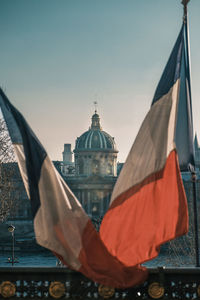 Low angle view of flag against sky