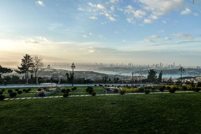 View of landscape against cloudy sky
