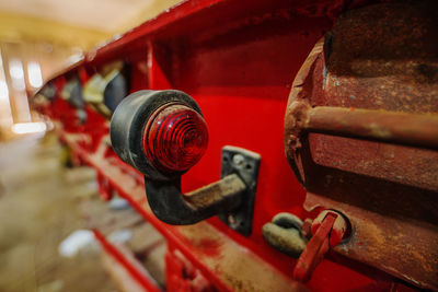 Red light on old machinery in workshop