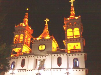 Low angle view of illuminated temple