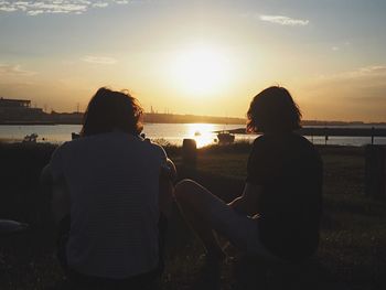 Scenic view of sunset over river