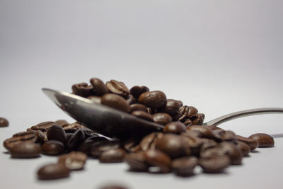 Close-up of coffee beans on table