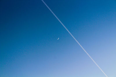 Low angle view of vapor trail in sky