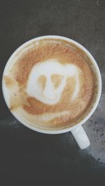 Close-up of cappuccino on table