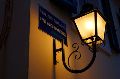 Low angle view of illuminated information sign