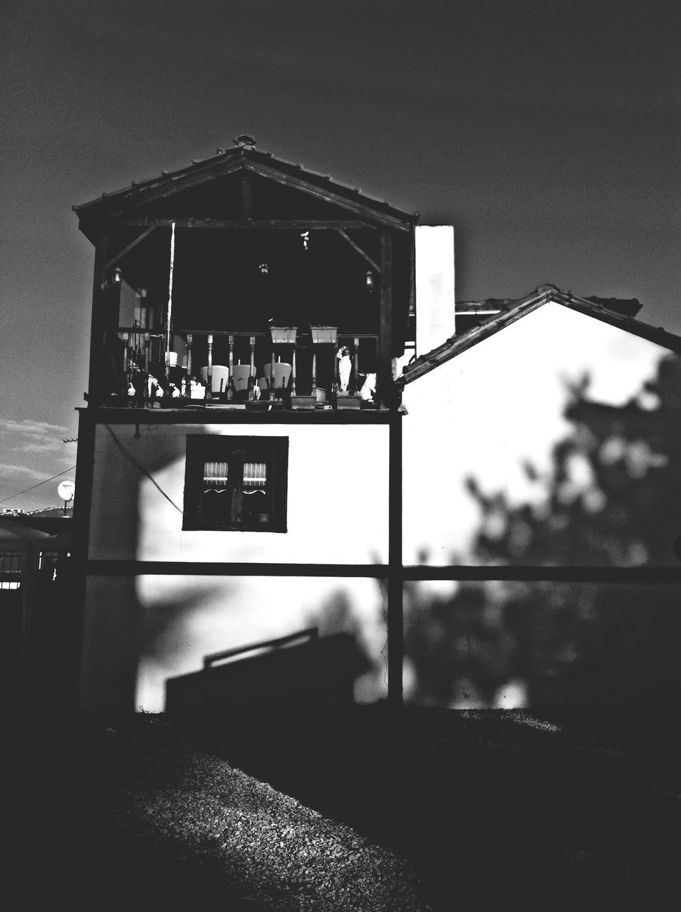 architecture, built structure, building exterior, window, sky, door, indoors, closed, no people, low angle view, building, day, entrance, wall - building feature, illuminated, house, religion, shadow