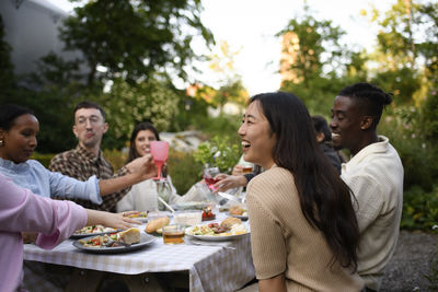 Friends having food at restaurant