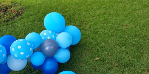 High angle view of balloons on field in park