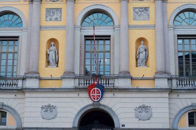Low angle view of text on building wall