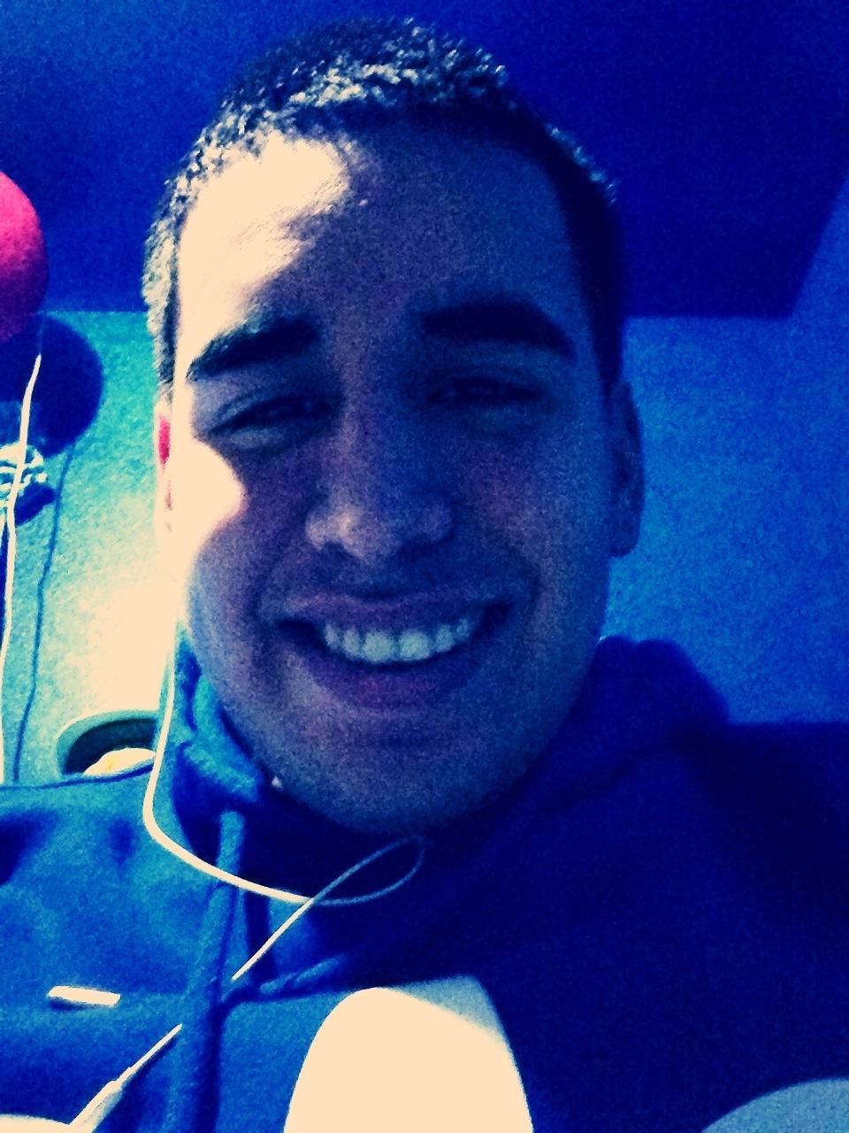 person, indoors, young adult, headshot, lifestyles, looking at camera, portrait, young men, leisure activity, front view, head and shoulders, mid adult, casual clothing, close-up, mid adult men, smiling, vehicle interior