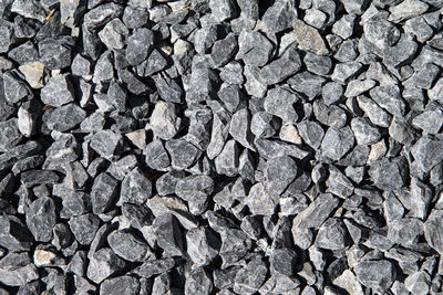 The image shows a grey gravel texture
