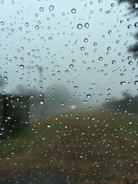 Close-up of water drops on glass