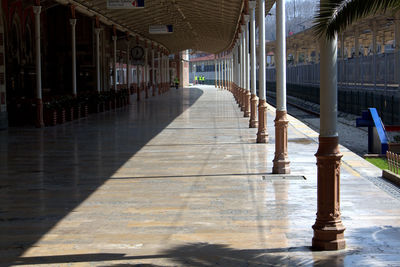 Columns in row at railroad station platform