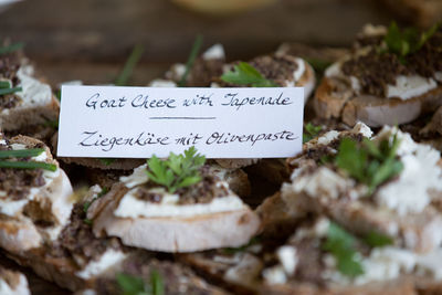 Close-up of text on food at table