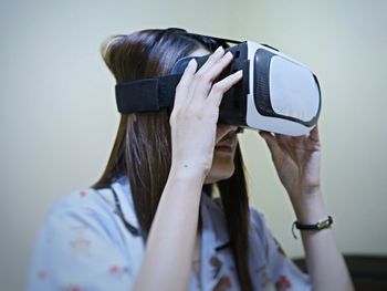 Close-up of woman using virtual reality simulator