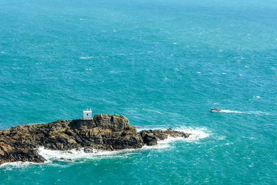 High angle view of blue sea against sky