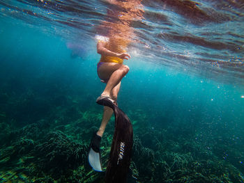 Man swimming in sea