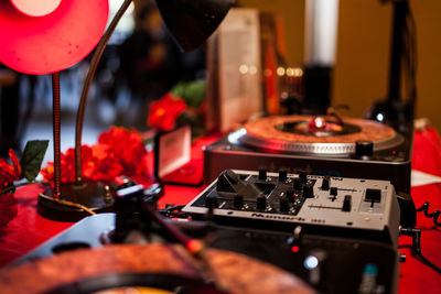 Close-up of sound mixer on table