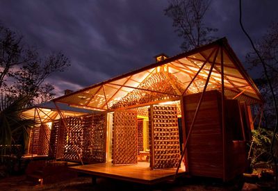 Built structure against sky at sunset