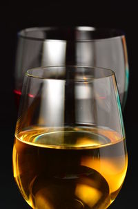 Close-up of drink over black background