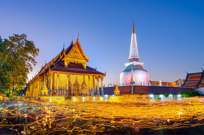 View of illuminated building against clear sky