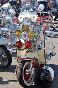 Close-up of motorcycle parked on road