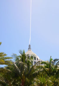 Low angle view of built structure against clear blue sky