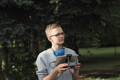 Drone pilot. controlling the drone in the open air. high quality photo