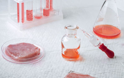 High angle view of bottles on table