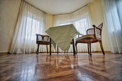 Empty chairs and tables at home