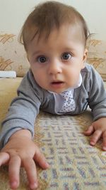 Portrait of cute baby at home