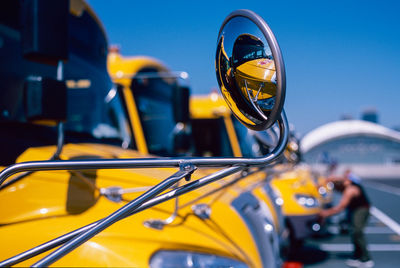 Yellow buses on street