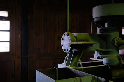 Close-up of old machinery in factory