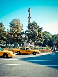 Blurred motion of car on road in city