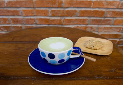 Cup of coffee on table